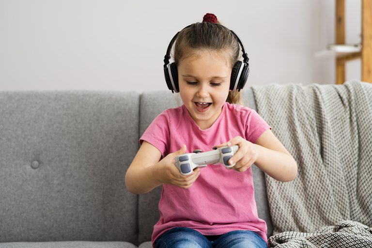 kid-playing-game-console